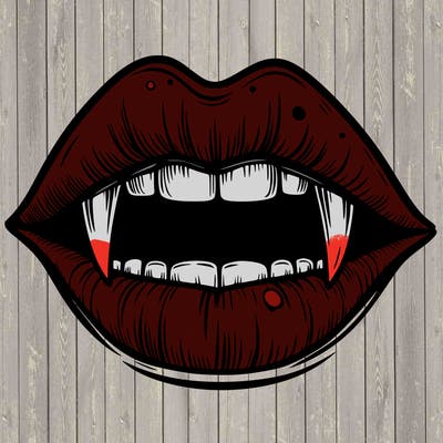 lips with vampire teeth