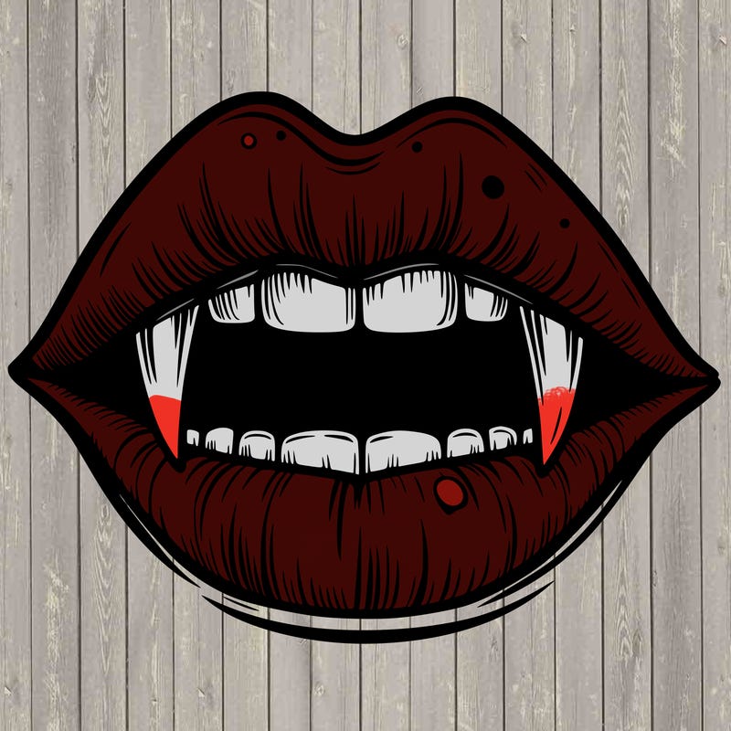 lips with vampire teeth