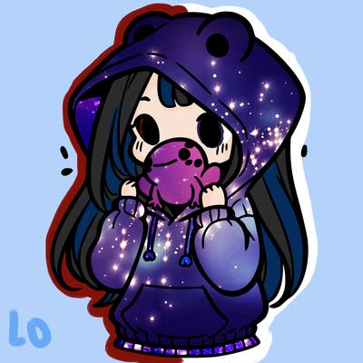 a girl holding a froggy hoodie