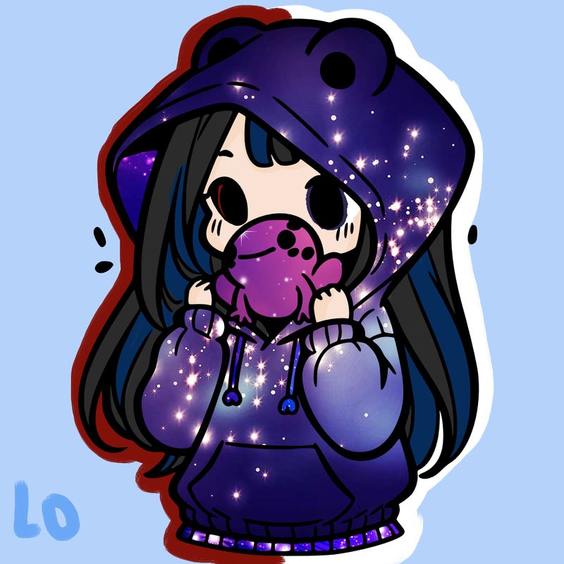 a girl holding a froggy hoodie