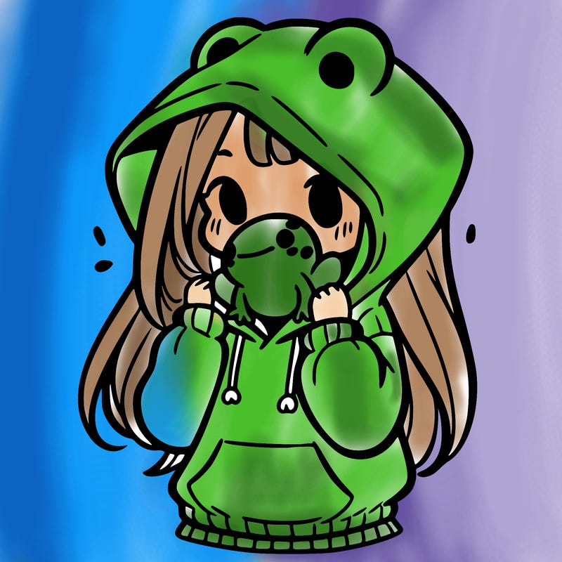 a girl holding a froggy hoodie
