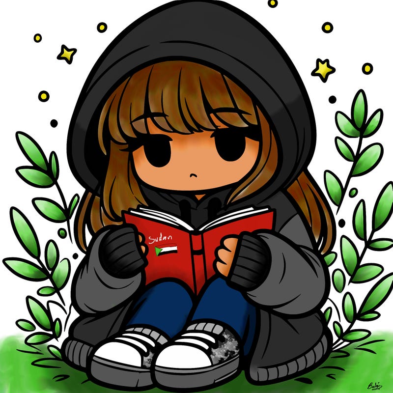 girl in oversized hoodie reading a book
