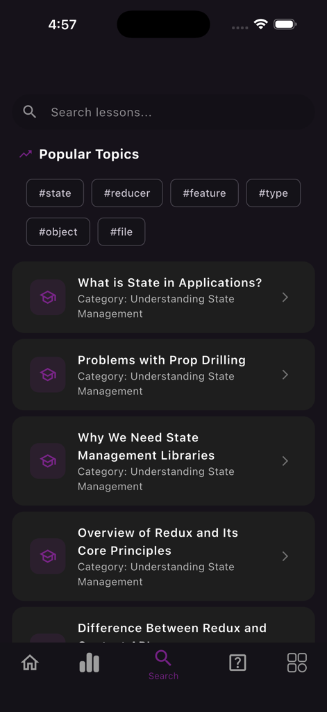 Learn Redux - Interface of the Learn Redux app search screen showing popular topics like state and reducer with a list of beginner lessons