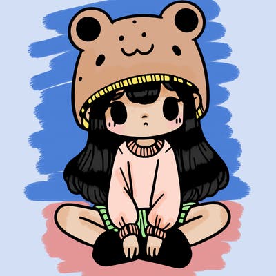 a girl wearing a frog hat and some frog socks