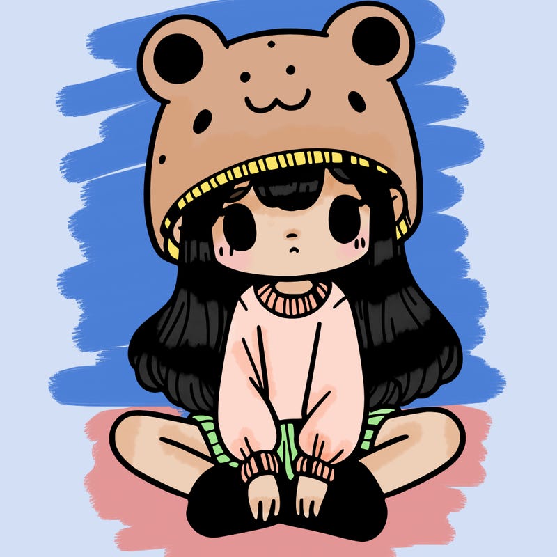 a girl wearing a frog hat and some frog socks