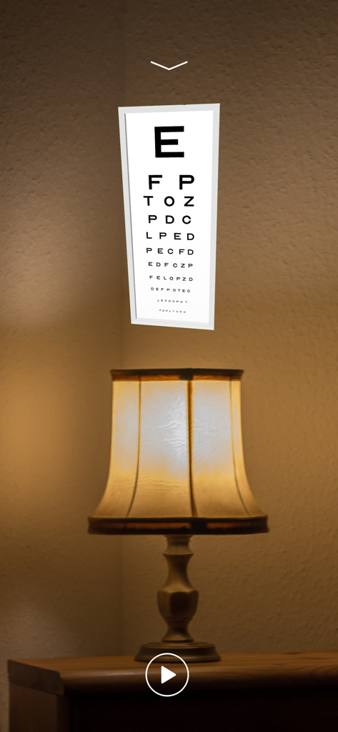 Snellen eye chart displayed on a wall using augmented reality