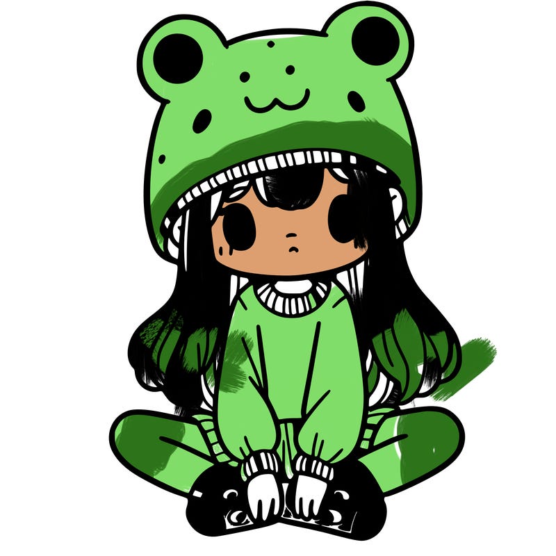 a girl wearing a frog hat and some frog socks