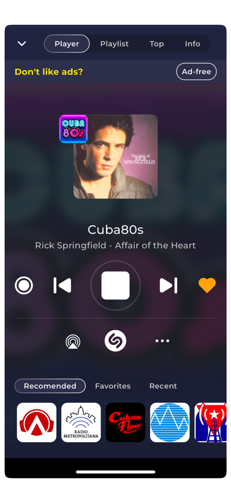 Radio Cuba Live FM AM Online - Music player interface of the Radio Cuba Live app playing the Cuba80s station with playback controls and Shazam integration