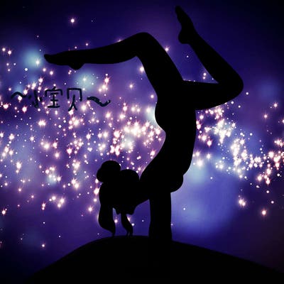 a woman doing a handstand