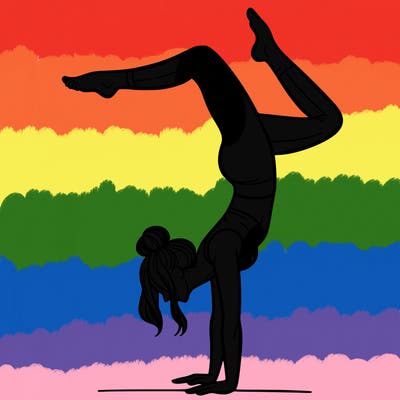 a woman doing a handstand