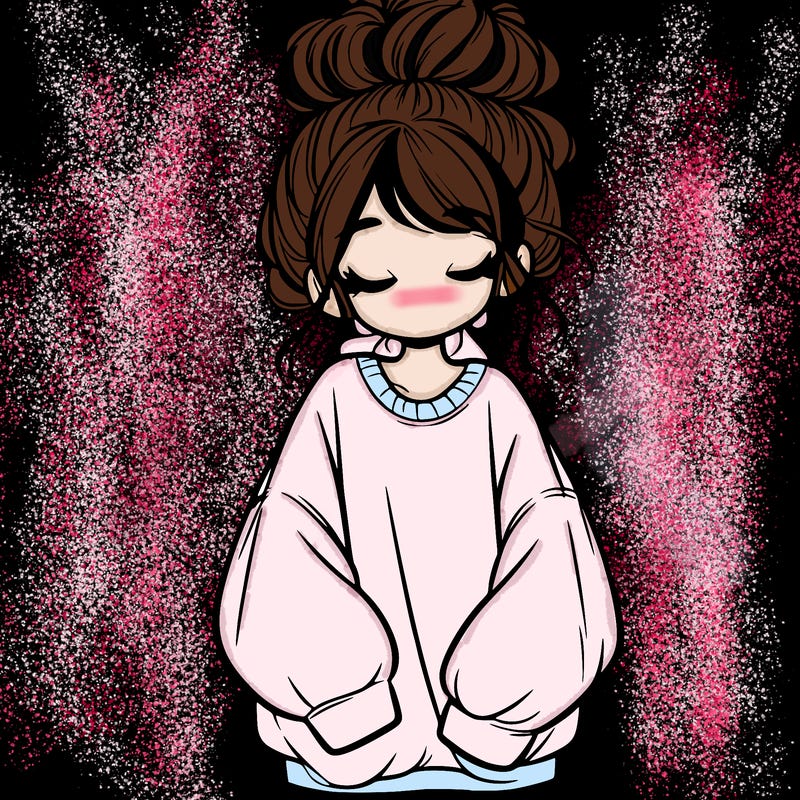 girl with baggy sweatshirt and messy bun