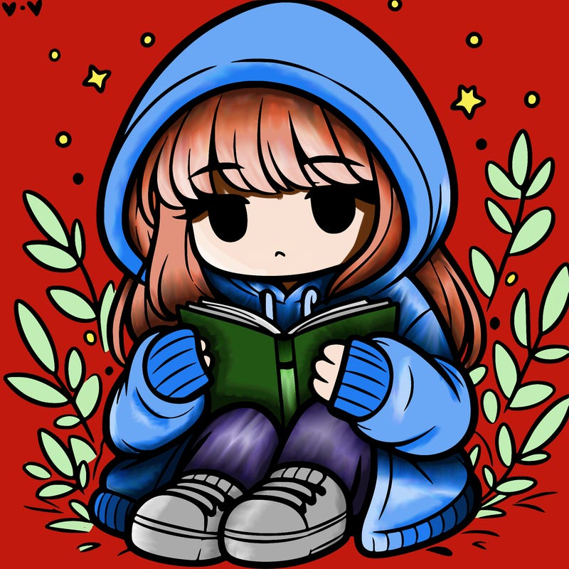 girl in oversized hoodie reading a book