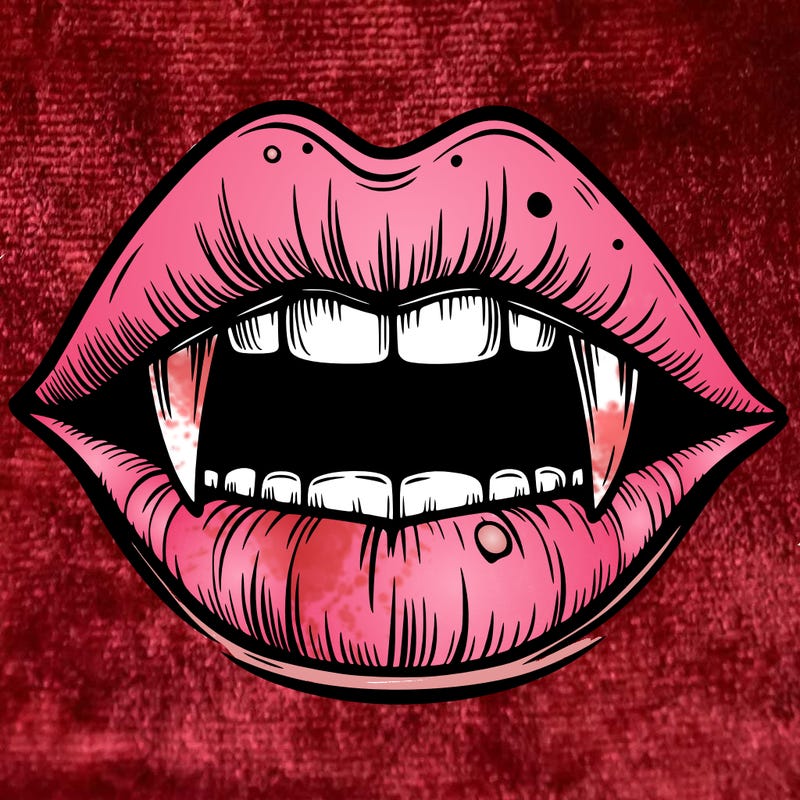 lips with vampire teeth