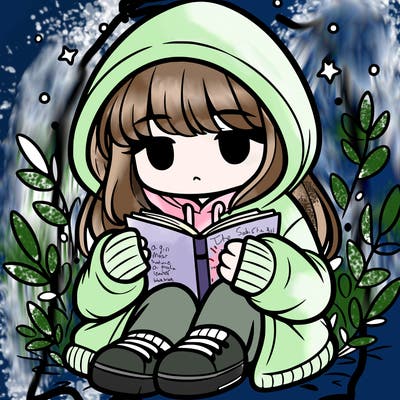 girl in oversized hoodie reading a book