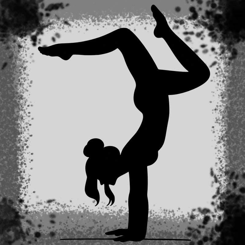 a woman doing a handstand