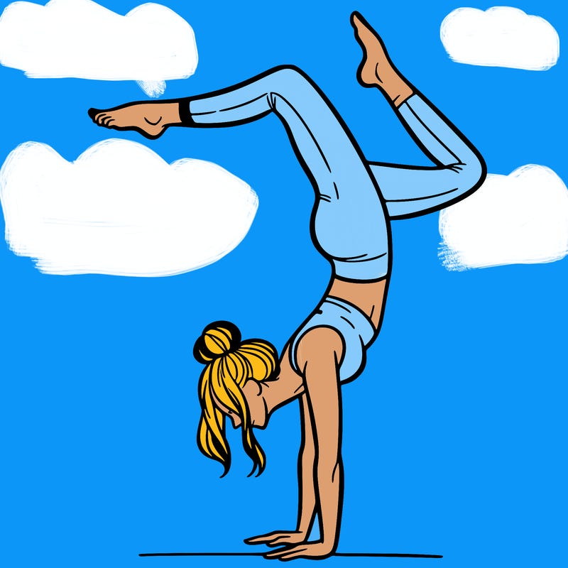 a woman doing a handstand