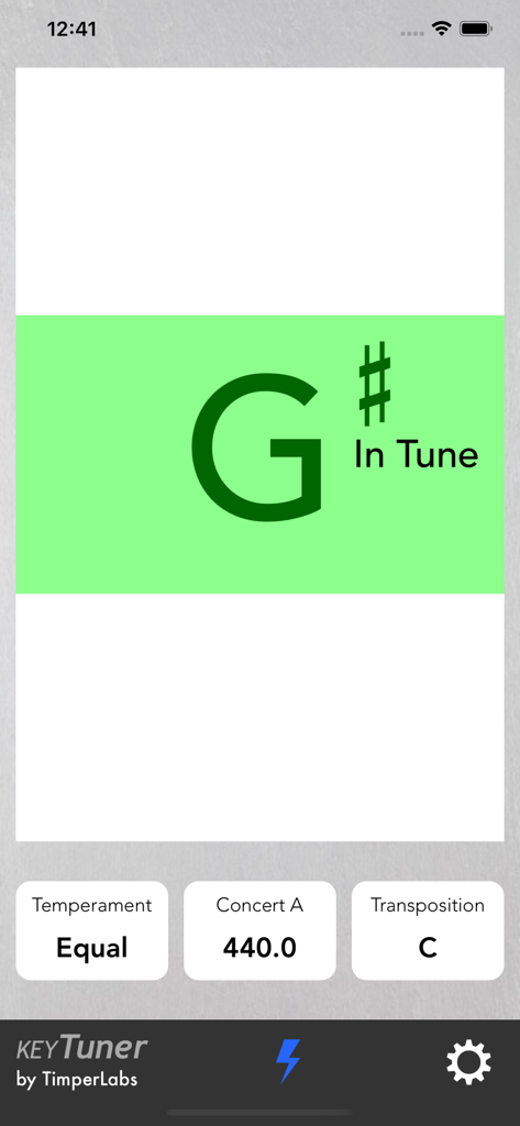 KeyTunerアプリのインターフェース。緑色の背景に、チューニングが合った大きなGシャープの音が表示されています。