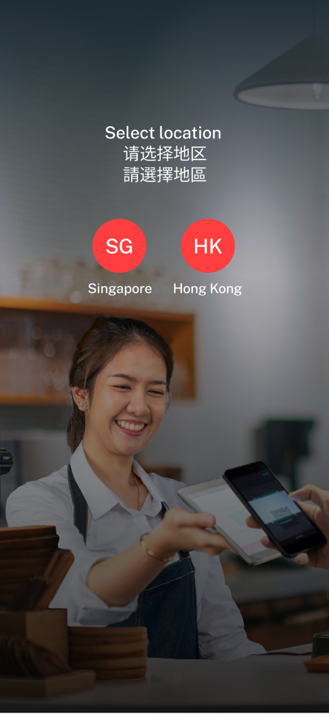 DBS MAX - DBS MAX app location selection screen showing Singapore and Hong Kong options with a merchant transaction in the background