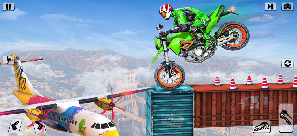 Un piloto de acrobacias de moto realizando un caballito sobre contenedores de envío en el aire junto a un avión