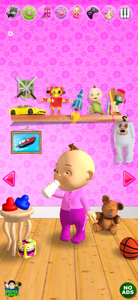 Talking Babsy Baby drinking from a bottle in a pink nursery playroom
