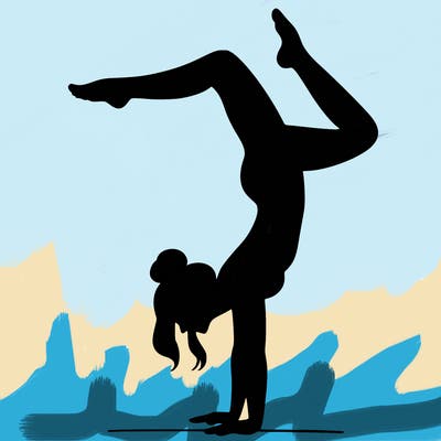 a woman doing a handstand