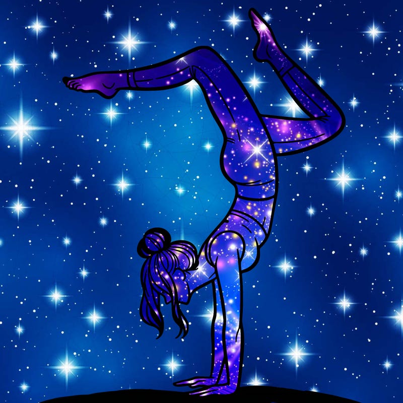 a woman doing a handstand