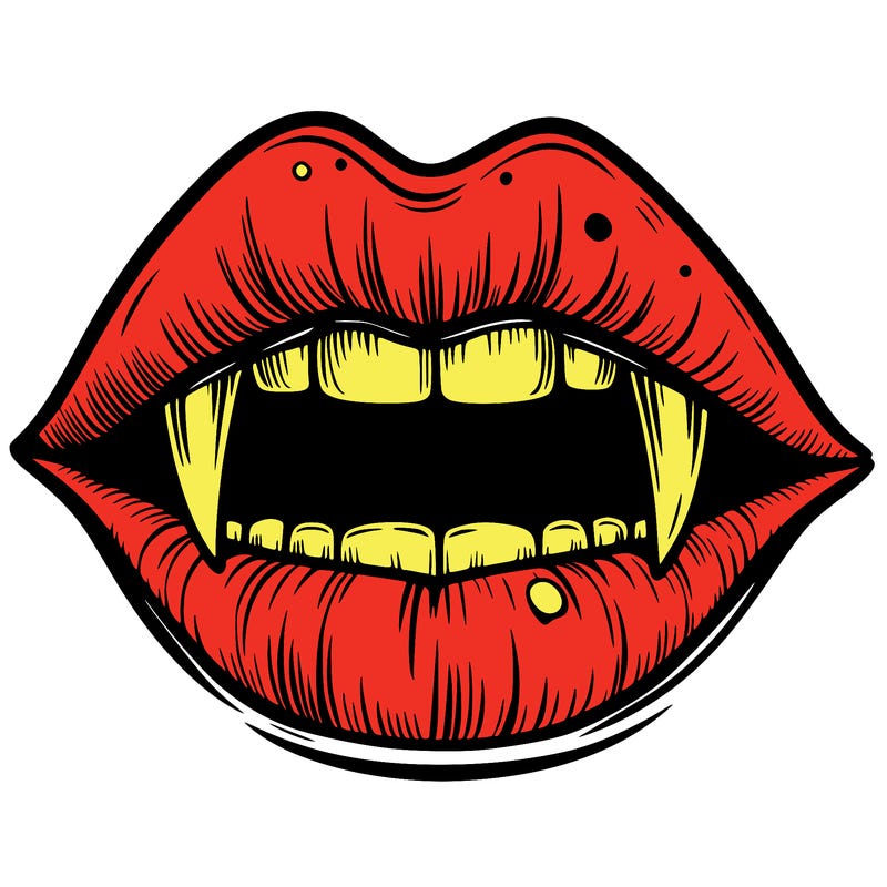 lips with vampire teeth