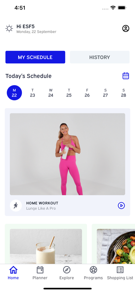 Emily Skye FIT: Workout App - The home screen of the Emily Skye FIT mobile app showing a scheduled home workout and navigation icons for planner and meals.