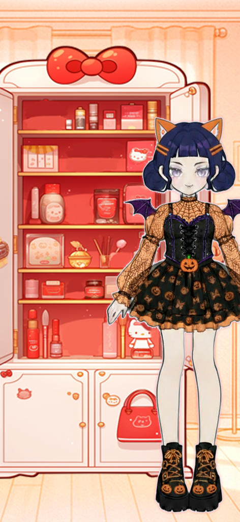 Sparkle Style: Dress up games - Un avatar elegante con un vestido con temática de calabaza y alas de murciélago parado frente a un armario de maquillaje