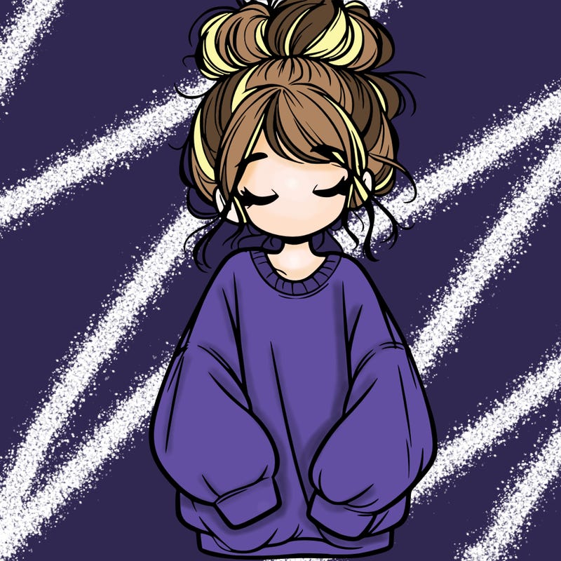 girl with baggy sweatshirt and messy bun