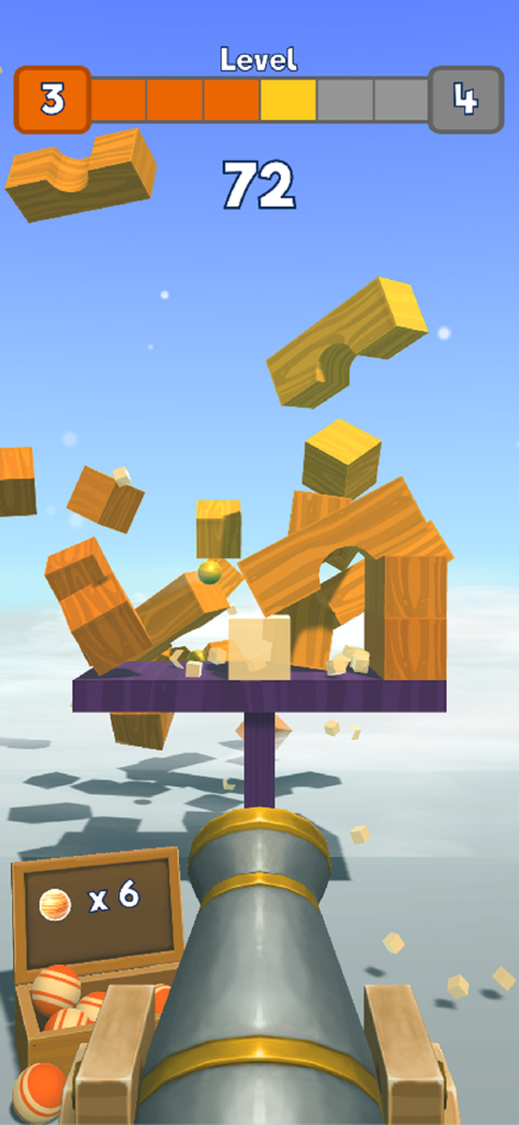 모바일 게임 Knock Balls에서 무너지는 나무 블록 구조물에 공을 발사하는 대포