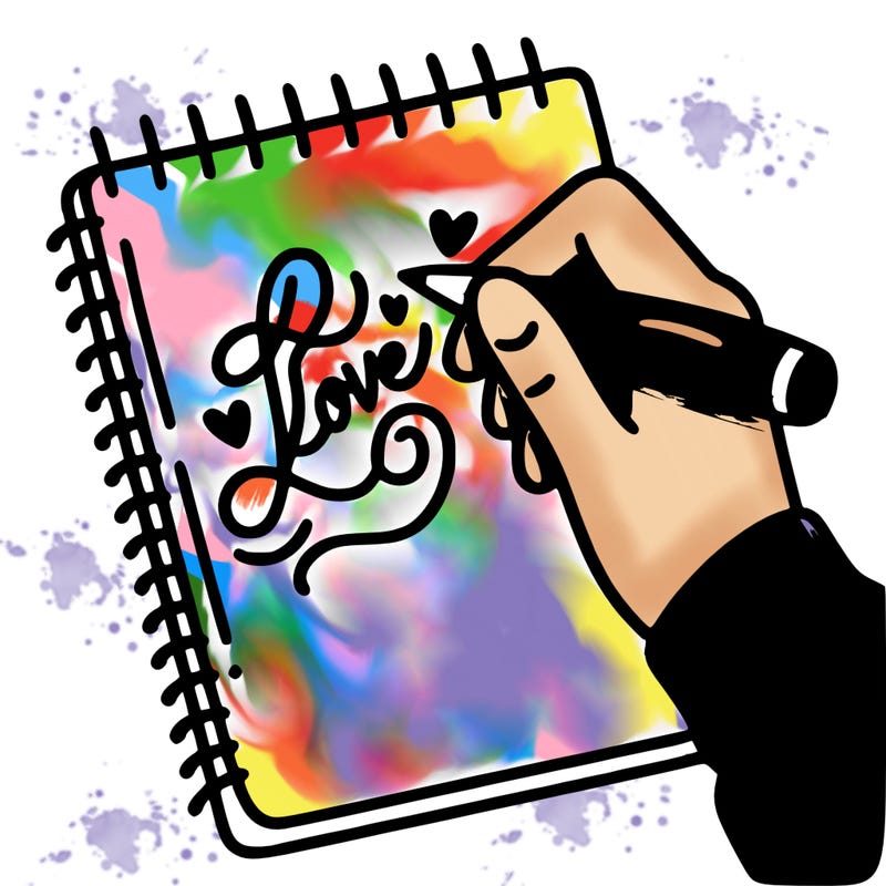 a hand writing “love” in calligraphy on a notebook