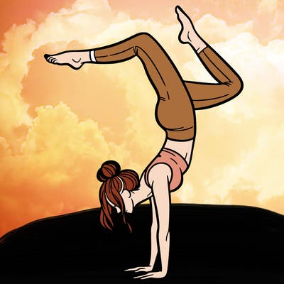 a woman doing a handstand