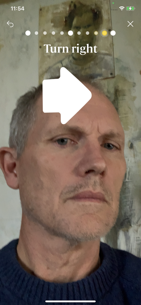 Topology Showcase - A person performing a 3D facial scan for custom eyewear fitting in the Topology Showcase app.