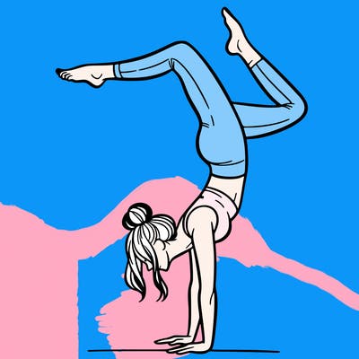 a woman doing a handstand