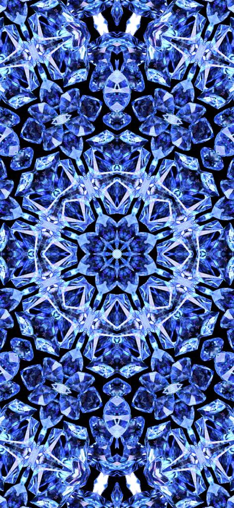 An intricate blue and white crystalline kaleidoscope pattern with radial symmetry