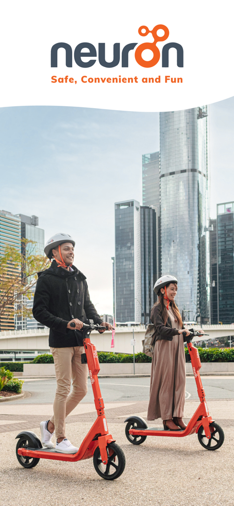 Neuron E-scooters and E-bikes - Two young professionals wearing safety helmets while riding orange Neuron e-scooters in a city environment