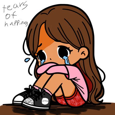 girl sitting with her legs to her chin, crying