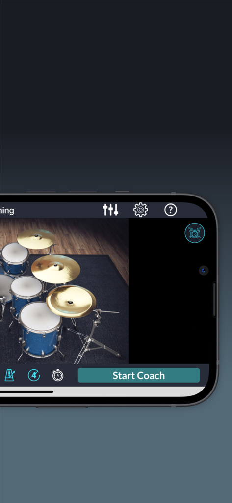 Drumstik app interface showing the coach mode screen with a virtual blue drum kit and a start coach button