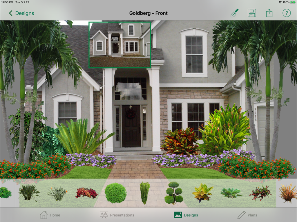 Landscape design being created on an iPad using the photo imaging tool to visualize plants and hardscapes on a house front