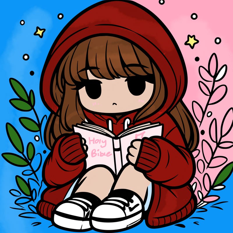 girl in oversized hoodie reading a book