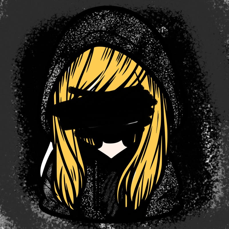 girl with hair covering her face and wearing a hoodie