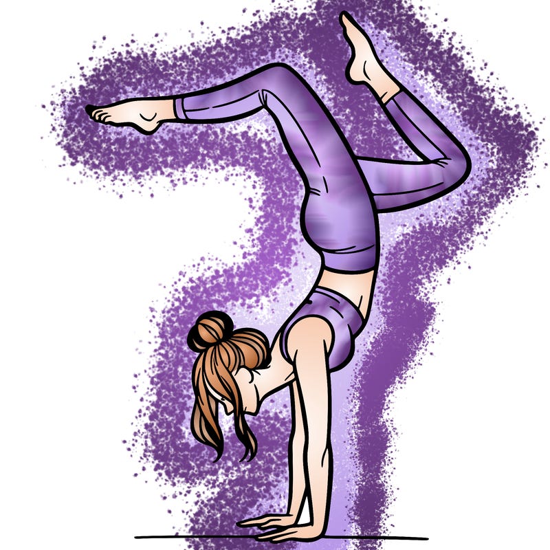 a woman doing a handstand