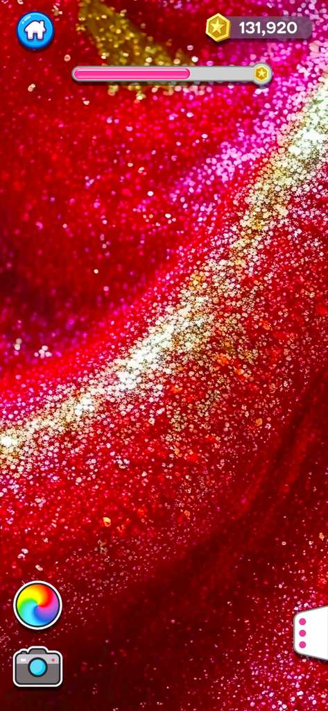 A close up of vibrant red glitter slime with a sparkling golden streak in the Super Slime Simulator app
