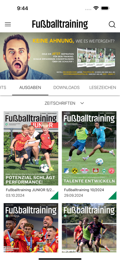 The Fußballtraining app interface showing digital soccer coaching magazine issues for youth and senior levels.