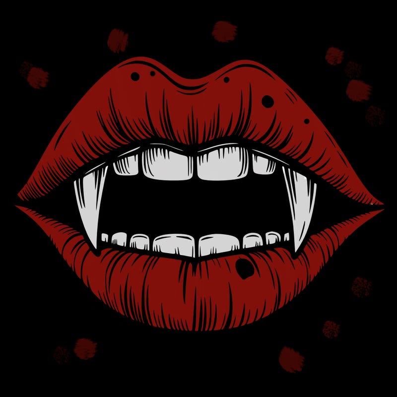 lips with vampire teeth