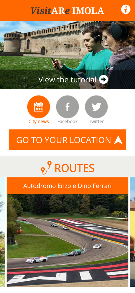 Pantalla de inicio de la aplicación VisitARe Imola mostrando botones de navegación y rutas turísticas, incluyendo el circuito de Ferrari