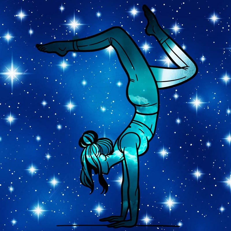 a woman doing a handstand