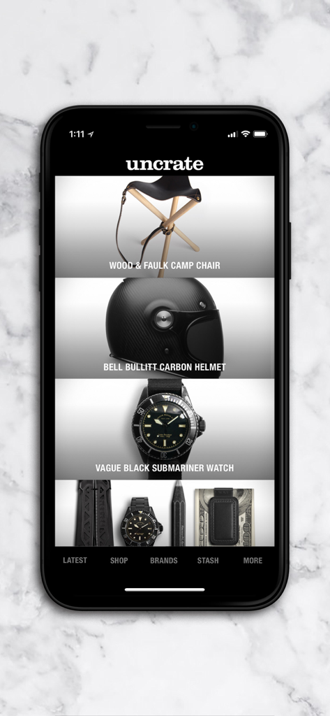 Uncrate mobile app interface showing a curated shopping feed of premium gear including a watch helmet and camp chair