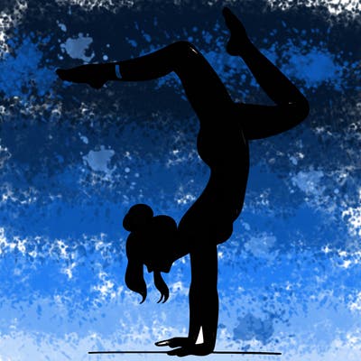 a woman doing a handstand